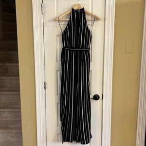 Suzy Shier. Jumpsuit. Halter tie. Open back